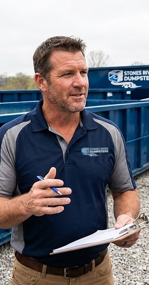 Peter, Stones River Dumpsters operations director, at the yard with the containers